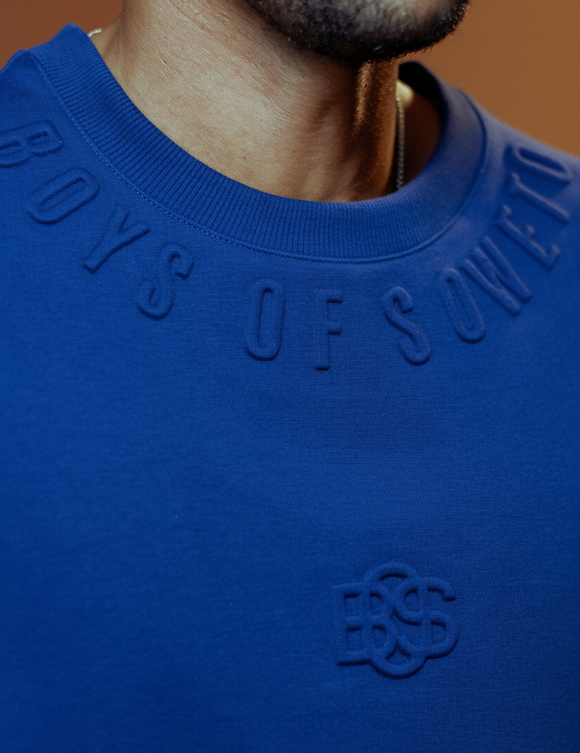 Blue Boys of Soweto T-shirt with terracotta background