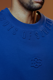 Blue Boys of Soweto T-shirt with terracotta background
