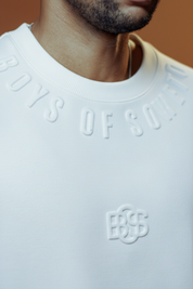 White embossed sweatshirt lifestyle shot